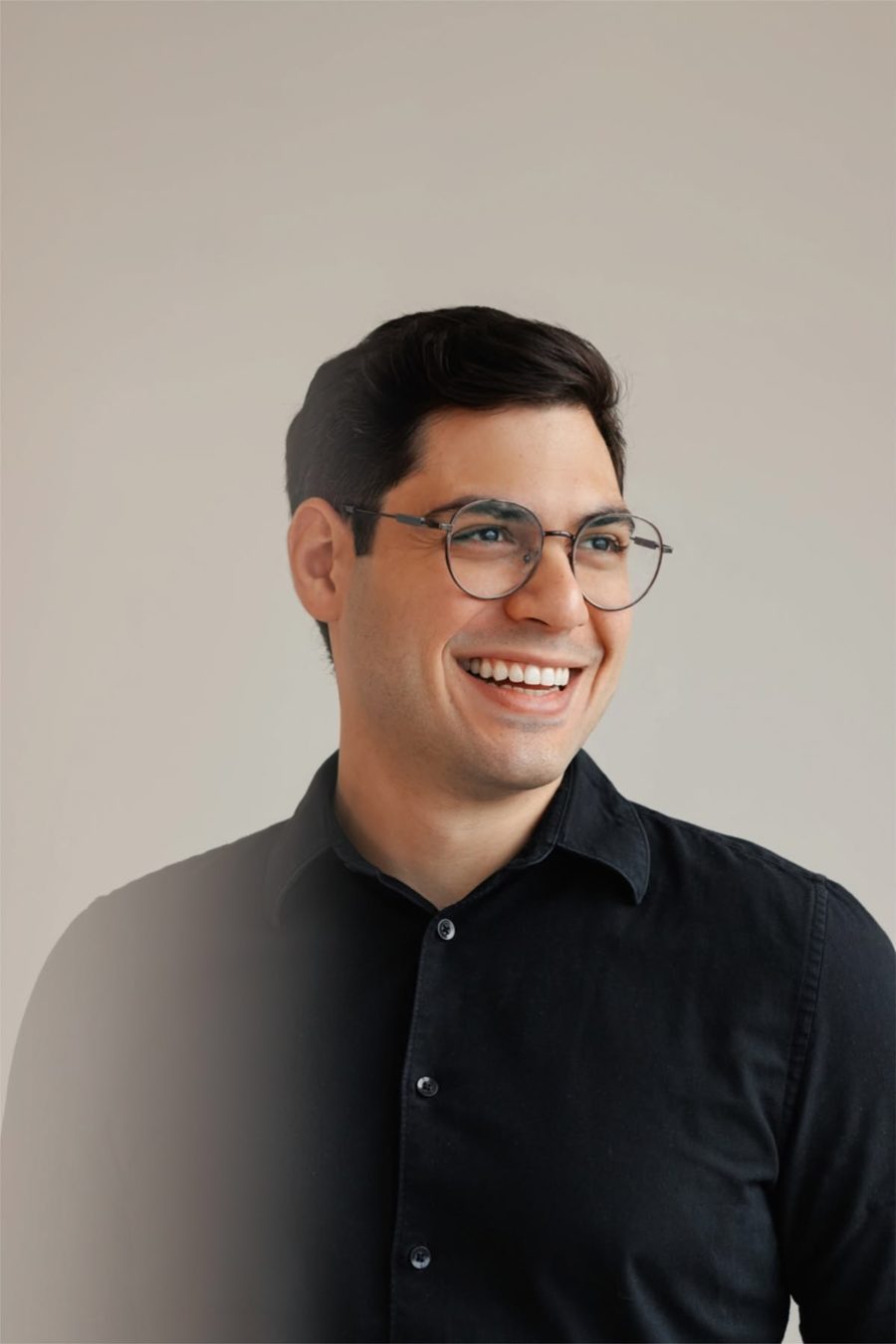 Clinician smiling in a bright office
